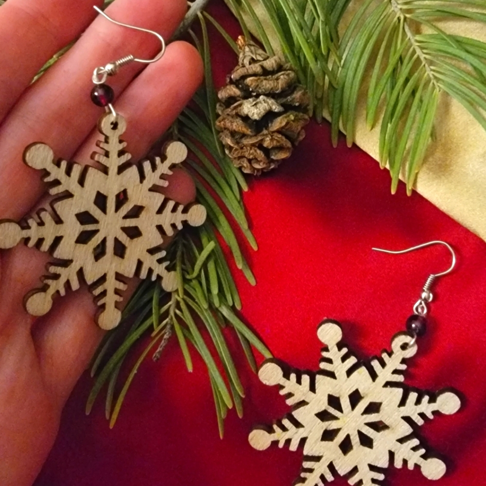 Snowflake earrings: lightweight laser cut wood, accented with vintage garnet
